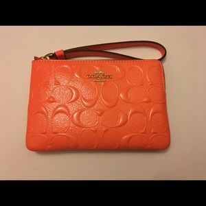 Brand new COACH Wristlet embossed